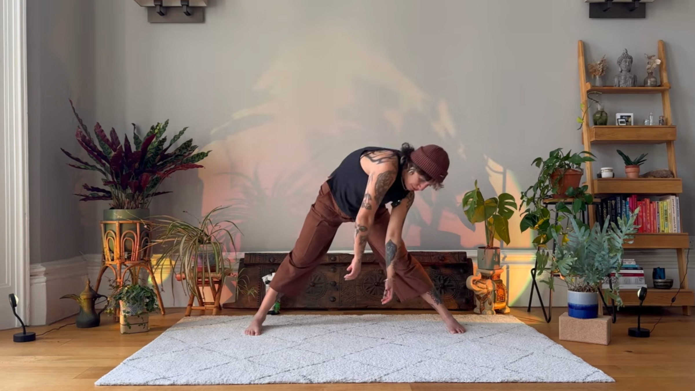 Olive Walton practicing spinal stretch.